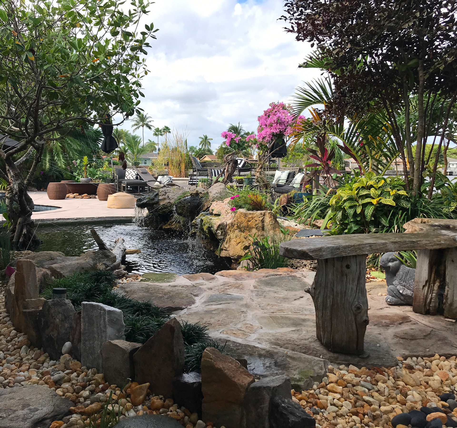 Vibrant garden featuring waterfall and plants