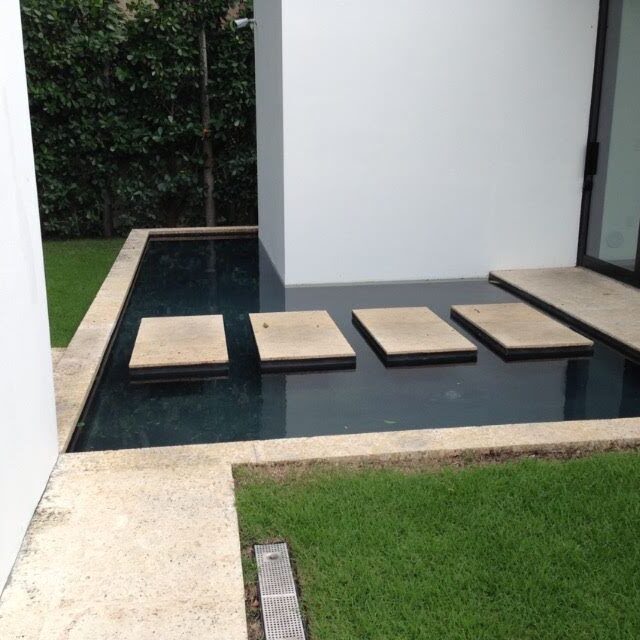 Modern patio with stepping stone reflecting pool